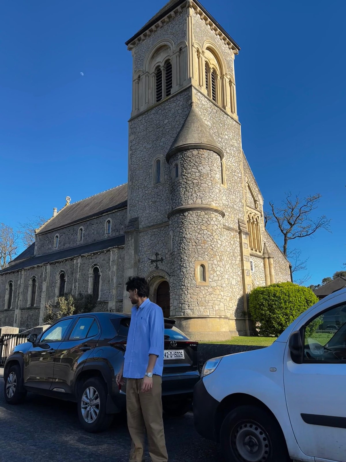 Standing outside a stone church in Ireland